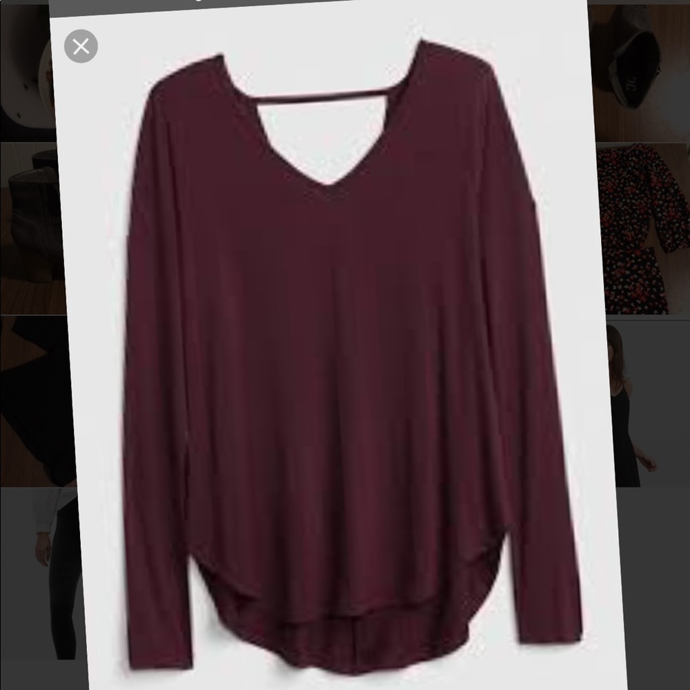 Long sleeved open back shirt. In maroon and grey